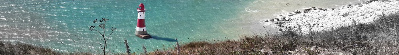 Lighthouse in shallow turquoise water